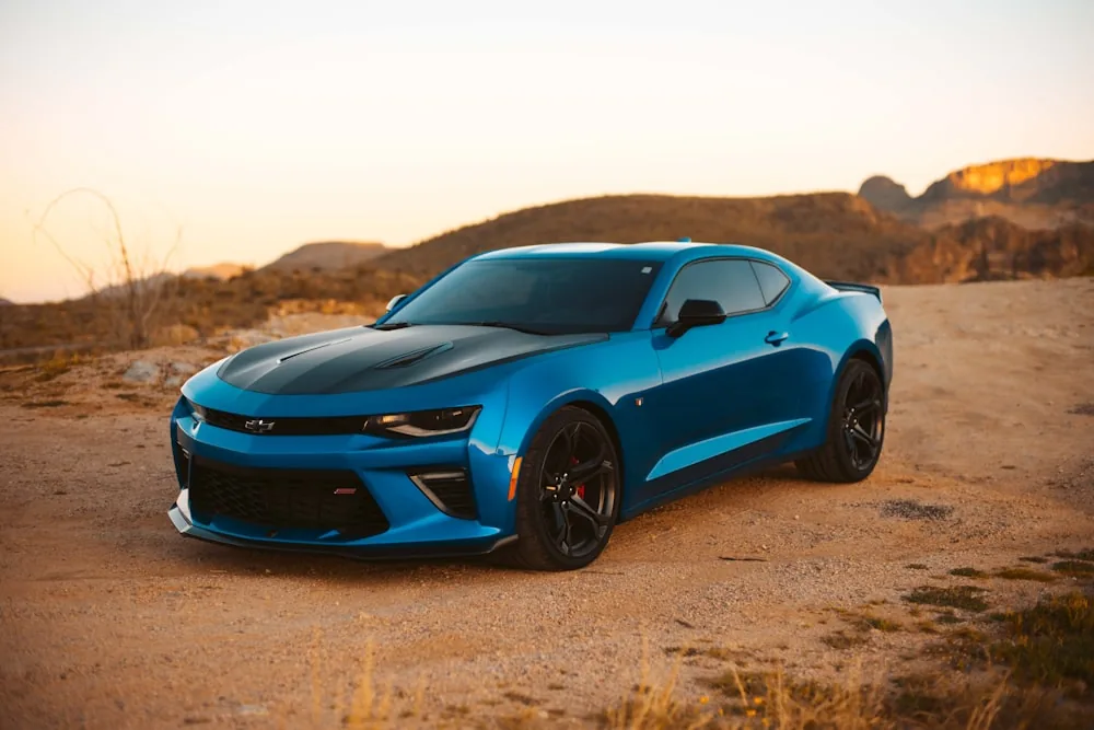 A freshly washed car at sunset
